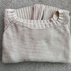 women’s poncho-style sweater.